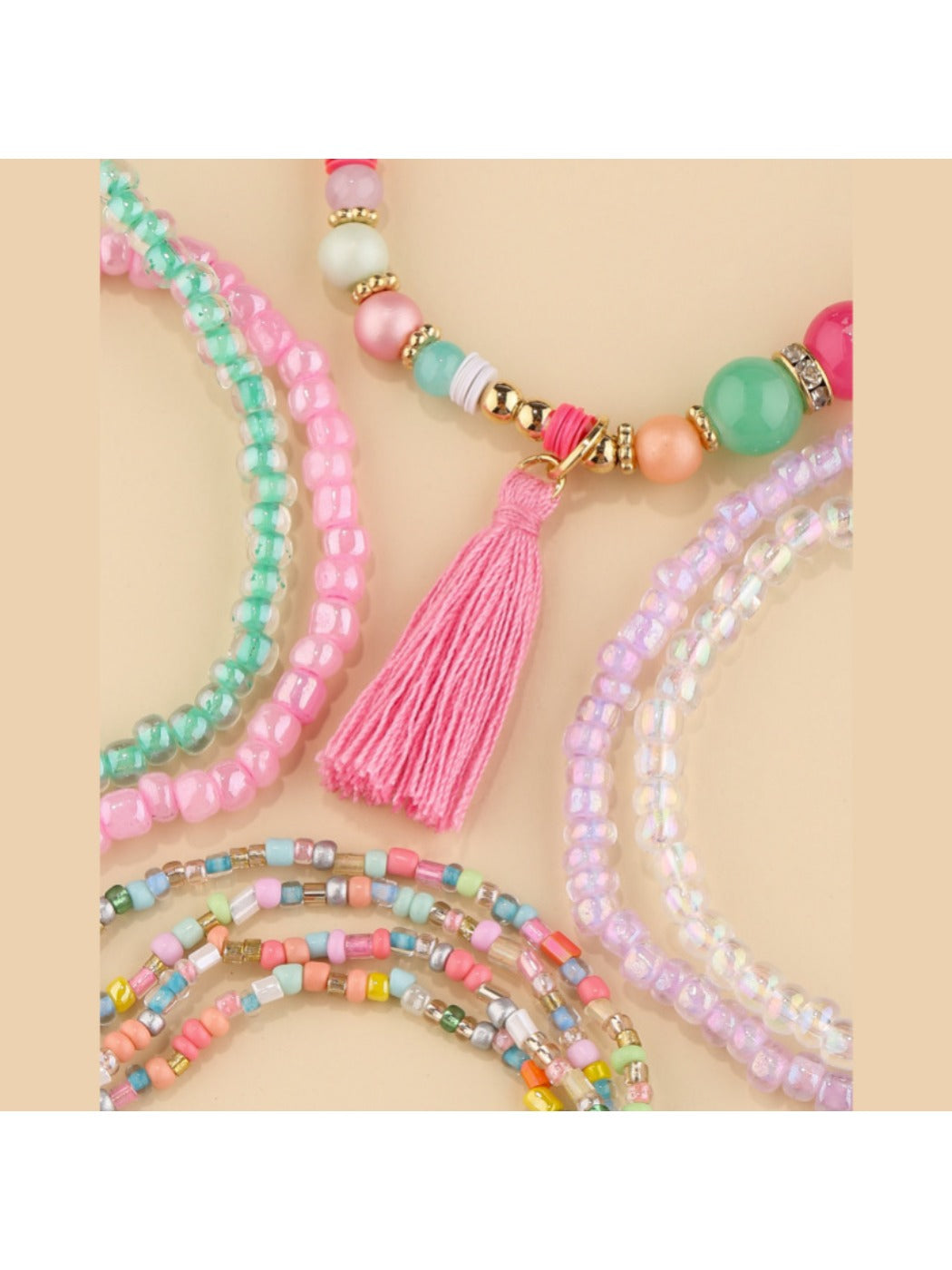 Lovra bracelet worn on wrist featuring multiple strands of bright beads in various colors
