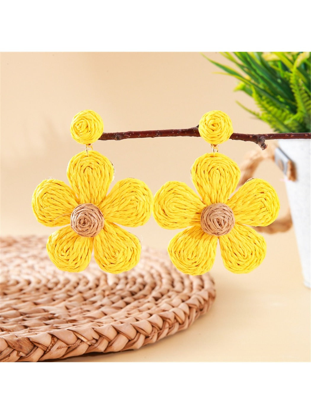 Close-up of the knitted texture on earedge flower shaped earrings
