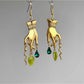 Earedge Magic Hand Pendant Earrings shown from a side angle highlighting details