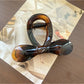Beau - Cutout Bow Tie Hair Claw Clip