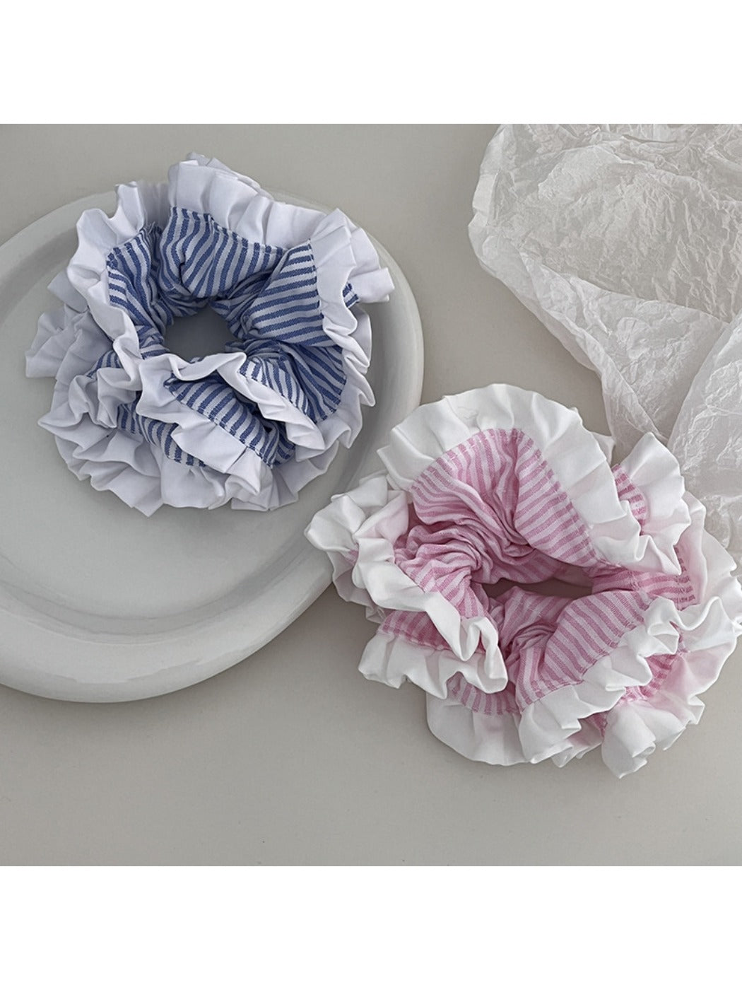 Gifty Sweet Stripe Ruffle Scrunchie in pastel pink and white stripes on a white background