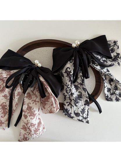 Side view of Beau Ink Wash Bow Ribbon Claw Clip highlighting bow shape