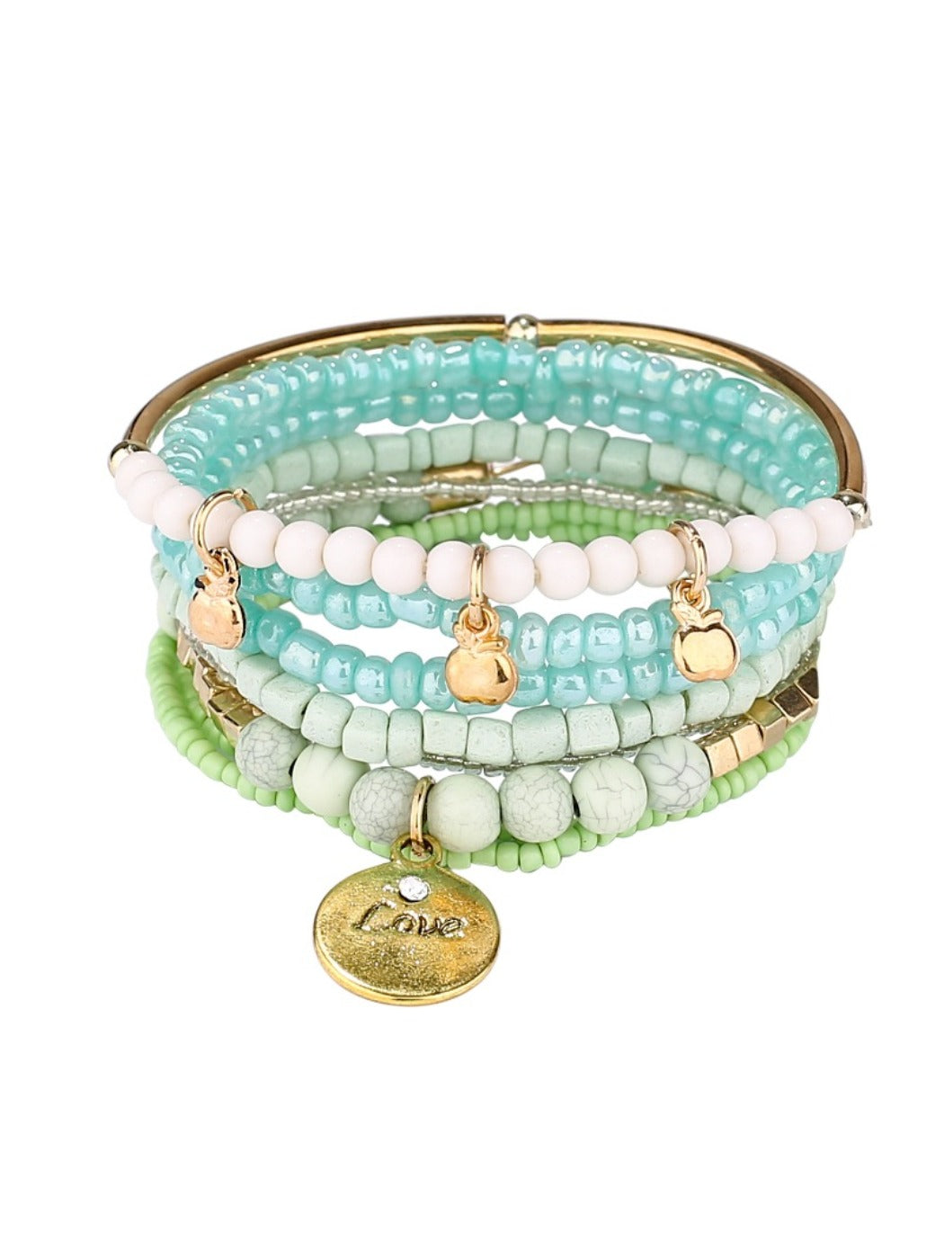 Model's hand adorned with Lovra stackable beaded bracelets holding a coffee cup
