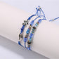 Lovra small bead bracelet laid flat showing full length and charm placement