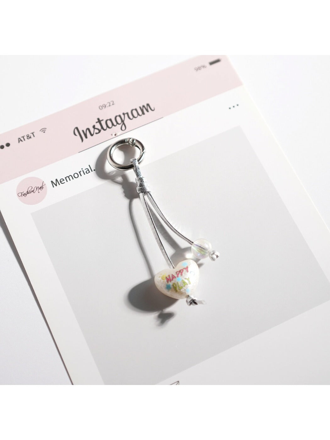 Multiple Keypus keychains in white style arranged in a row