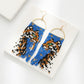 Earedge - Long Animal Shaped Tassel Earrings