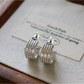 Earedge - Textured Knot Design Fashion Stud Earrings