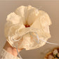 Gifty double layer tulle scrunchie styled in a ponytail on model