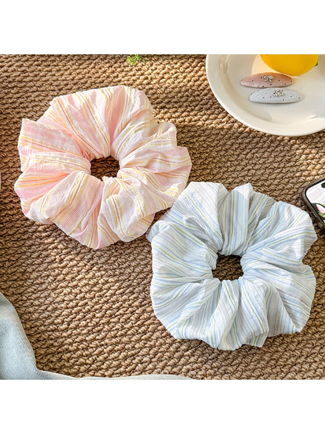 Gifty elegant solid color striped scrunchie in soft beige fabric with subtle stripes