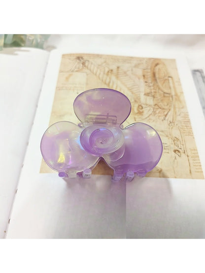 Beau Sweet Acetate Medium Flower Claw Clip angled to show translucent acetate material