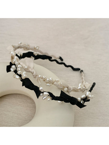 Side view of Gifty Sweet Oval Bead Bow Headband highlighting bead arrangement and bow