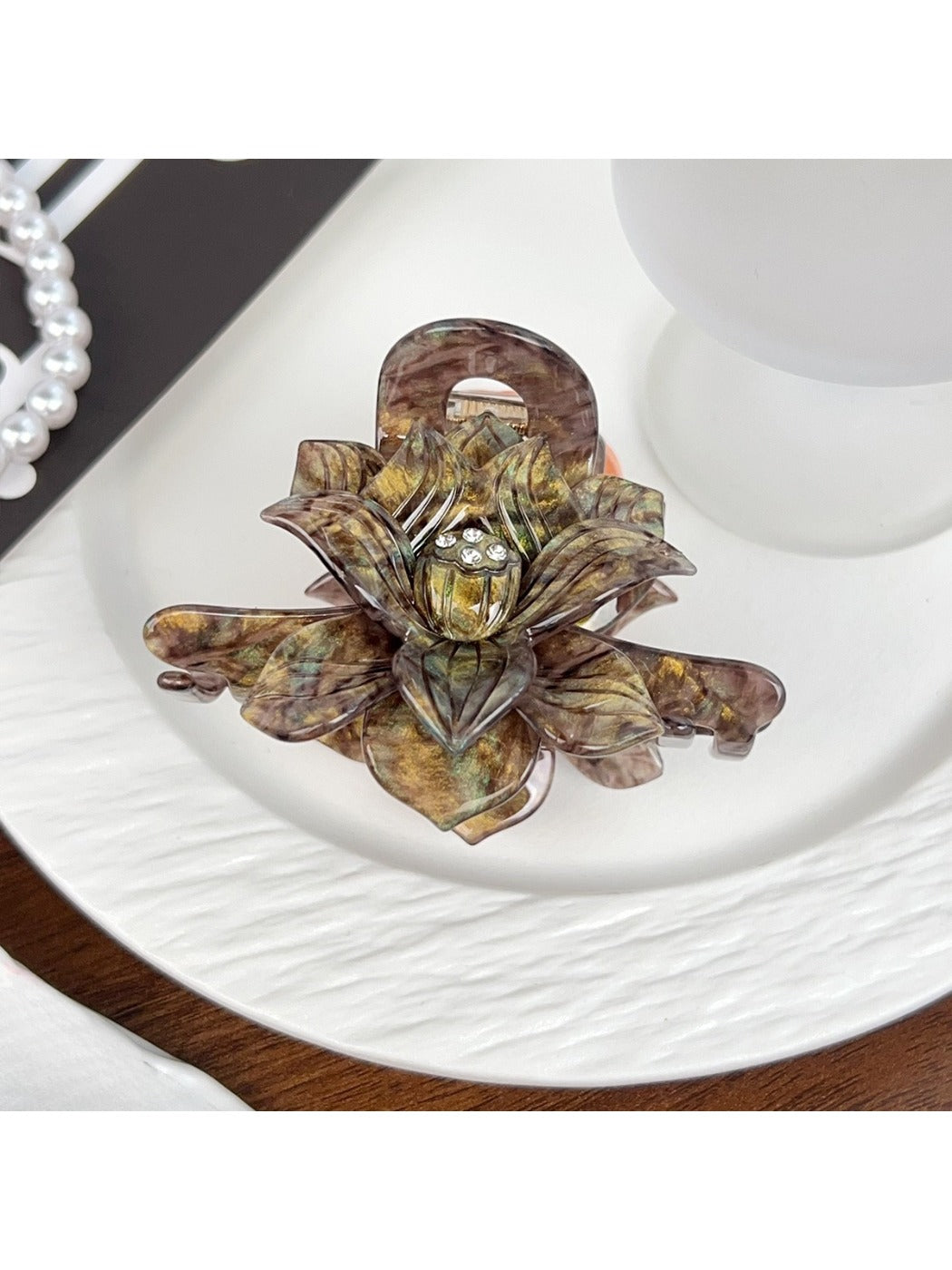 Beau classic lotus shaped hair claw clip in beige shown from multiple angles