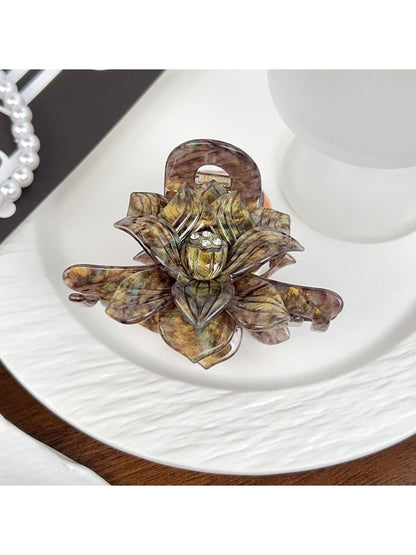 Beau classic lotus shaped hair claw clip in beige shown from multiple angles