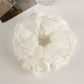 Multiple Gifty scrunchies in different pastel colors arranged in a circle