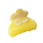 Side view of Beau colorful flower pattern hair clip with metal clasp