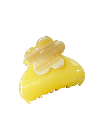 Side view of Beau colorful flower pattern hair clip with metal clasp