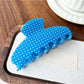 Beau Candy Polka Dot acetate claw clip displayed with matching accessories