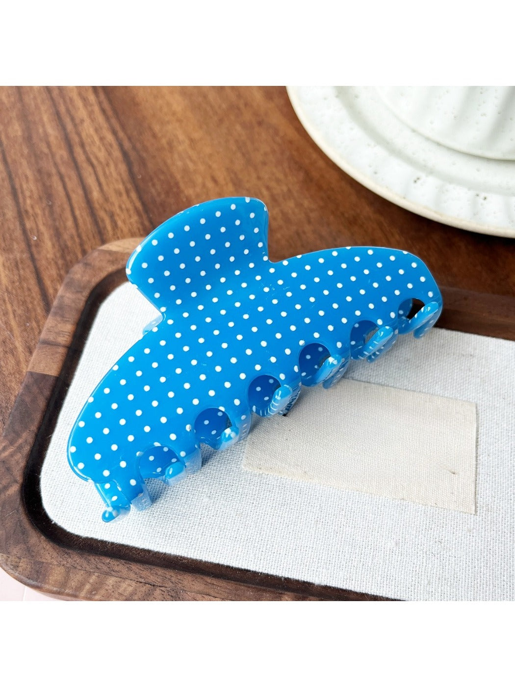 Beau Candy Polka Dot acetate claw clip displayed with matching accessories