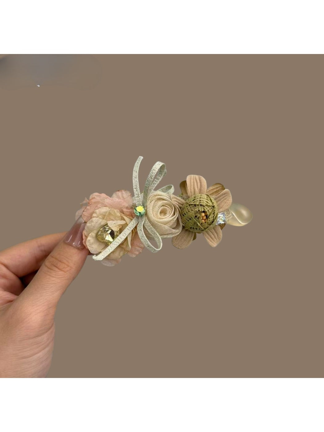 Beau 3D flower shaped hair clip in soft pink on white background