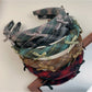 Side view of Gifty plaid bow headband highlighting bow shape