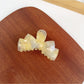 Beau bow shaped hair claw clip in beige with smooth matte finish