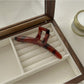Beau claw clip shown with packaging box featuring brand logo and minimalist design