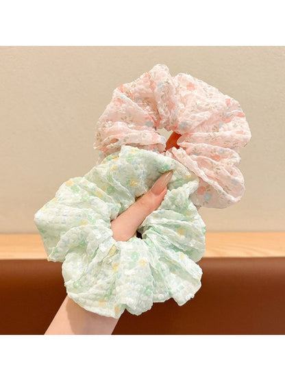 Top view of Gifty tiny floral print scrunchie showing fabric texture