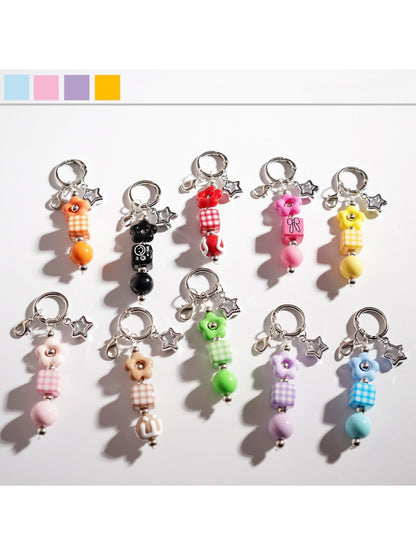 Close-up of a cute beaded star-shaped keychain with colorful beads