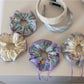 Side view of Gifty checkered bow ribbon scrunchie showing bow detail