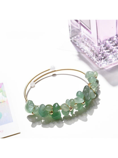 Lovra bracelet styled with casual outfit on model's wrist