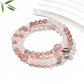 Close-up of Lovra pink crystal beaded bracelet showing detailed beadwork and color contrast