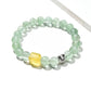 Close-up of Lovra green fluorite beaded bracelet with polished round stones