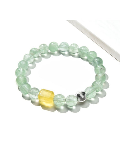 Close-up of Lovra green fluorite beaded bracelet with polished round stones