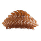 Beau stylish leaf shaped hair clip angled to show thickness