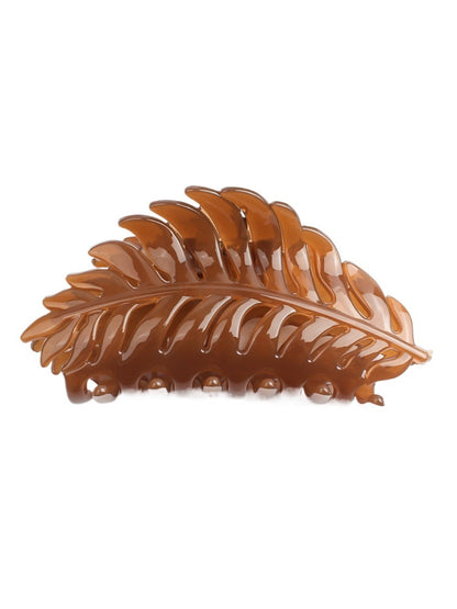 Beau stylish leaf shaped hair clip angled to show thickness