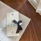 Beau - Elegant Beaded Bow Hair Clip