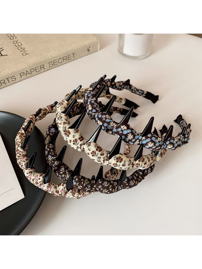 Vintage floral print headband with soft fabric and twisted knot design