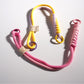 Close-up of vibrant twisted rope keychain with silver keyring