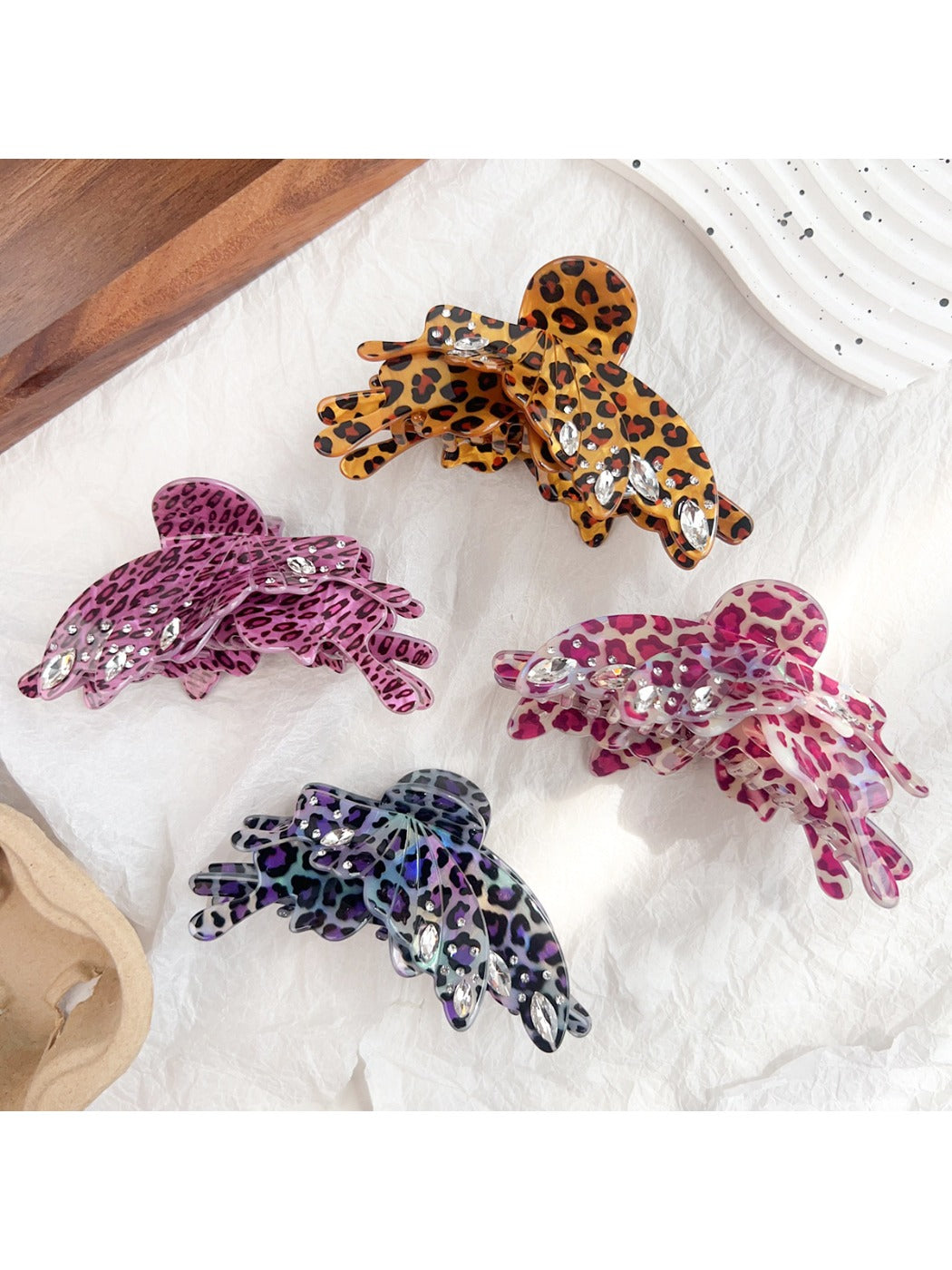 Close-up of Beau leopard print butterfly claw clip showing detailed pattern
