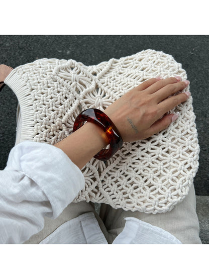 Detailed shot of clasp and finish on Lovra Chic Irregular Bangle Bracelet