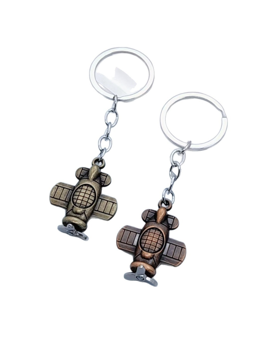 Airplane keychain attached to a backpack zipper pull