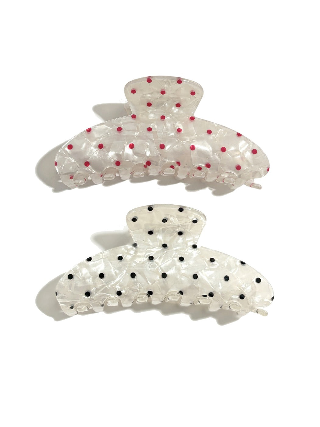 Beau polka dot updo claw clip holding brown hair in a bun