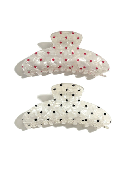 Beau polka dot updo claw clip holding brown hair in a bun