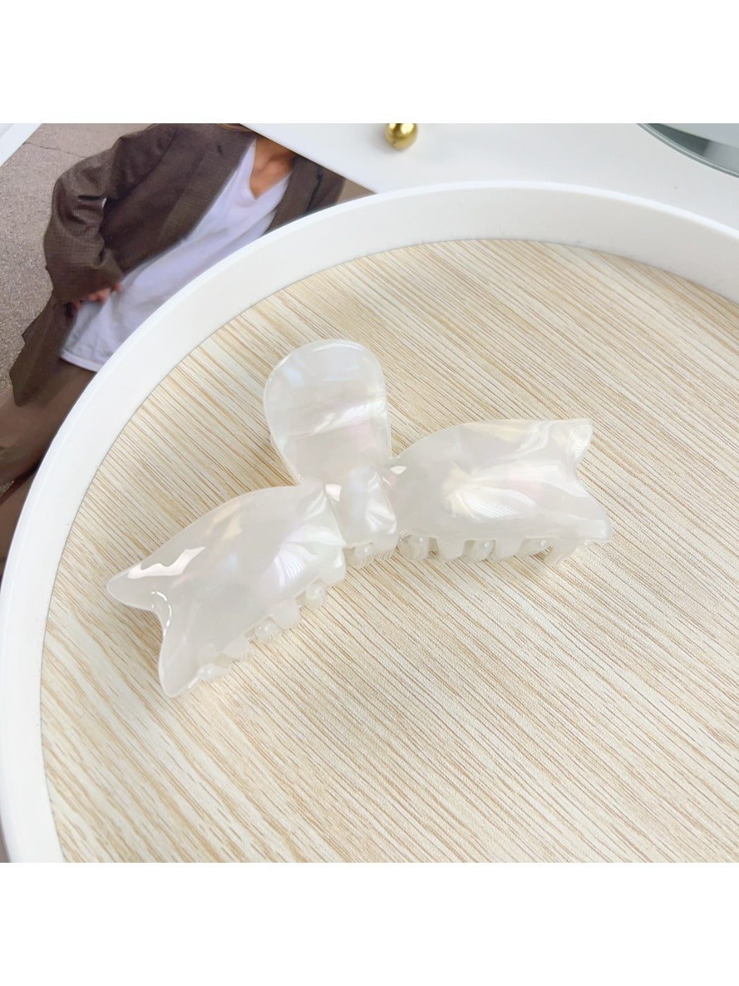 Top view of Beau sweet bow shaped hair claw clip showing symmetrical design
