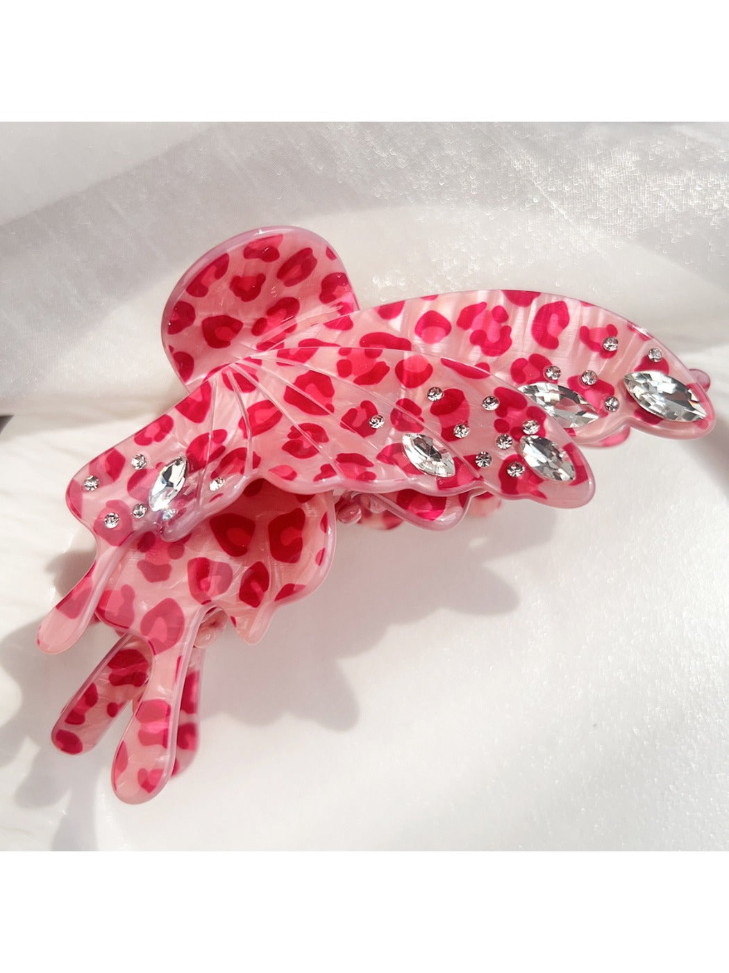 Beau leopard print butterfly claw clip clipped onto hair