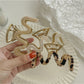 Side view of Beau vintage wave line claw clip highlighting claw teeth
