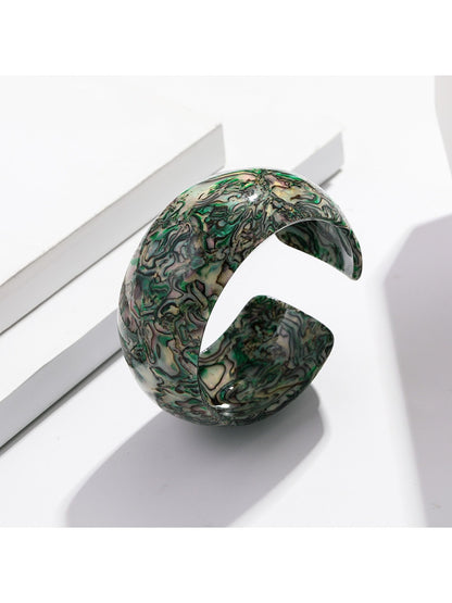 Lovra vintage ombre open cuff bracelet displayed with soft lighting emphasizing ombre effect