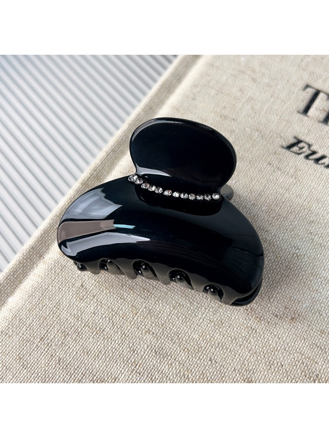 Beau hair claw clip displayed on a white background, angled view