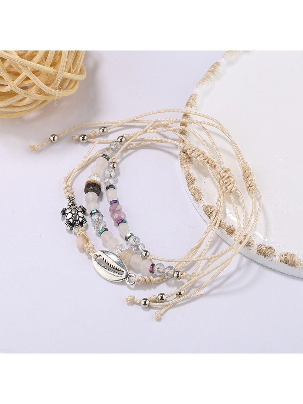Lovra small bead bracelet worn on wrist highlighting charm and bead design