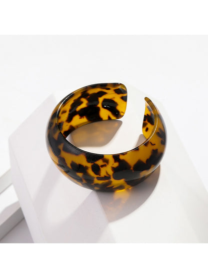 Close-up of Lovra vintage ombre open cuff bracelet showing textured metal details